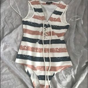 ON HOLD— —FASHION NOVA STRIPED BODYSUIT